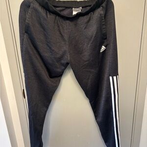 Adidas Gray Sweatpants with Iconic Stripes